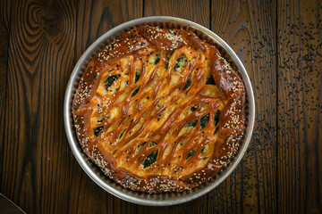 meat pie on a wooden table
