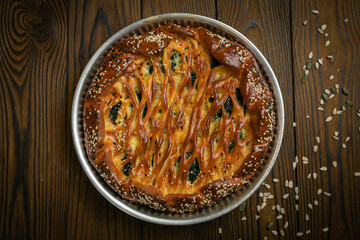 meat pie on a wooden table
