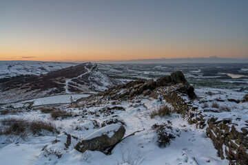 Hen Cloud winter sunrise and snow at The Roaches, Staffordshire.