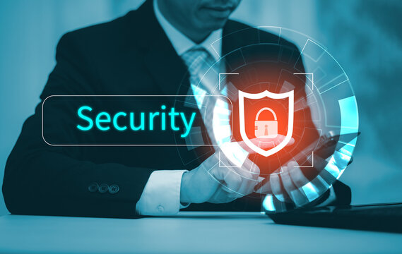 Businessman hand holding mobile phone, Digital Composite Image Of user Using Laptop With, cyber security concept, data protection and secure internet access, cybersecurity online technology.