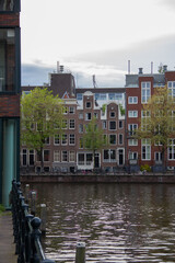 Different houses next to the canal in Amsterdam
