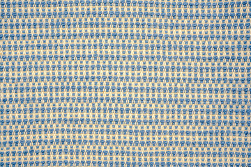 Fashionable background, jeans and linen texture. Macro view of blue and beige shades fabric texture background. Fabric samples