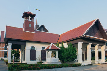 Old large Christian cross on the top of located church