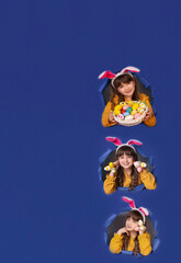  Girl at Easter with bunny ears and painted eggs