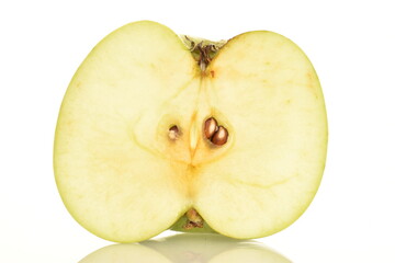 Naklejka na ściany i meble One half of a green Renet Simirenko apple with a jute napkin, close-up, isolated on white.