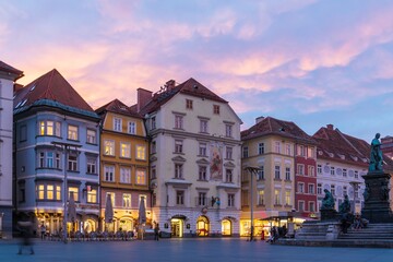 Houses on Hauptplatz and Erzherzog Johann Brunnen  at night, Graz, Austria