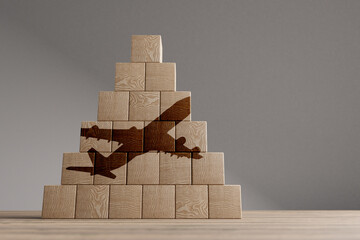 Wood cubes with airplane on a beautiful wooden table, studio background. Business concept and copy space.