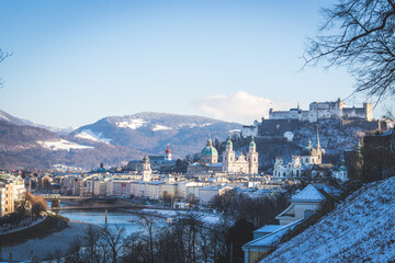 Fototapeta na wymiar Panorama of Salzburg in winter: Snowy historical center and old city