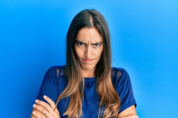 Young beautiful woman wearing casual clothes skeptic and nervous, disapproving expression on face...