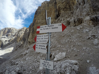 Sign with hiking trails in Italy