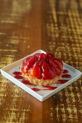 Strawberry pie on plate.