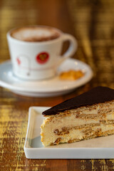 Cup of capuccino and cake. 
