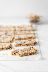 Vegan Energy Oat Bars With Coconut, Rice Puffs and Dried Cranberries Fruits, Flat Lay