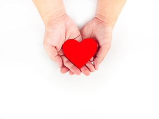 A red heart wrapped on both hands On a white background