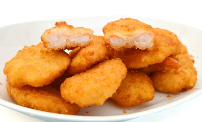 Breaded Butterfly Prawns - Deep fried battered prawns filled in plate on white background