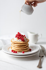 American Peanut Pancakes with Cranberries, Maple Syrup and Yoghurt , Morning Flat Lay