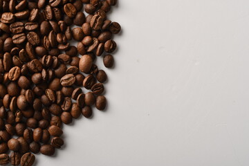 Coffee beans isolated on white background with copy space for text. Coffee background or texture concept.