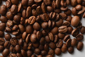 Coffee beans isolated on white background with copy space for text. Coffee background or texture concept.