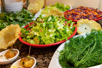 Vegetables on the open buffet. Salad bar.