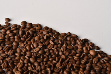 Coffee beans isolated on white background with copy space for text. Coffee background or texture concept.