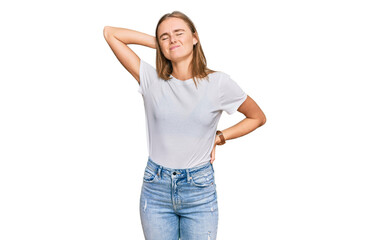 Obraz premium Beautiful young blonde woman wearing casual white t shirt suffering of neck ache injury, touching neck with hand, muscular pain