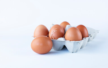 cardboard box with organic chicken eggs