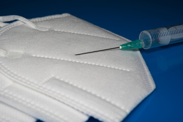 medical masks and vaccinations against covid-19