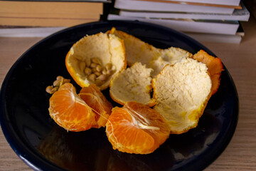 split tangerine on a plate