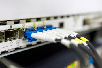 close-up of switching equipment, which includes optical cables