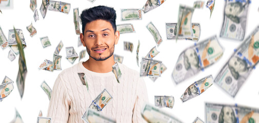 Handsome latin american young man wearing casual winter sweater looking positive and happy standing and smiling with a confident smile showing teeth