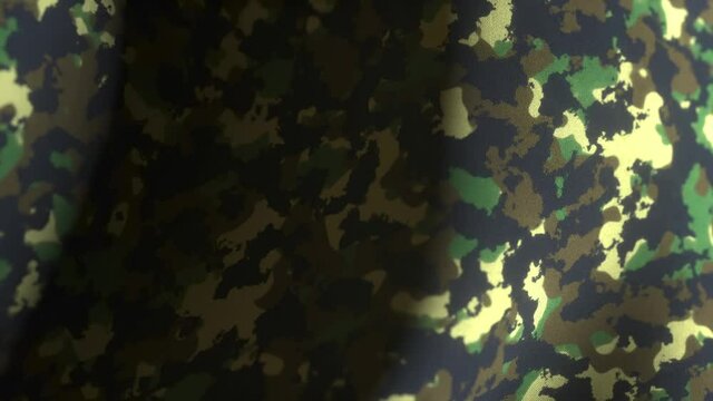 Animation on military camouflage fabric. Military background. Elegant and luxurious dynamic style for military and military action template.