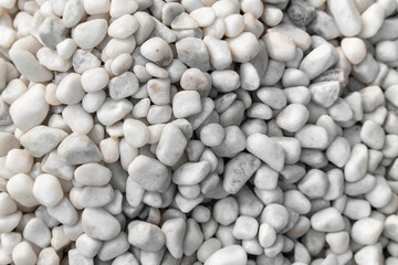 Group Of Different Shapes And Sizes Of Smooth Shiny White Colored Stones Or Pebbles Suitable For Background Or Wallpaper