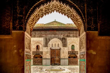Papier Peint photo Lavable Maroc Intricate tile patterns, metal work and plaster carvings adorning  building exteriors in Fez Morocco