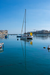 Obraz premium Colorful Boats in Harbor of Marsaxlokk Malta at springtime
