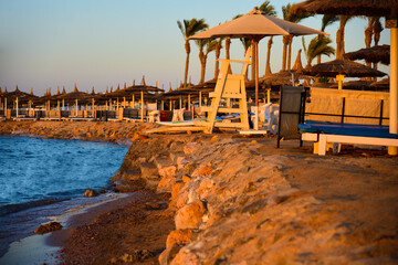 Lifeguard place on the sea beach in the evening.