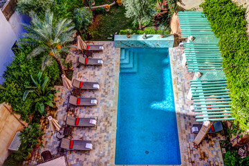 Pool and deck area of Riad Laaroussa in Fes Morocco.