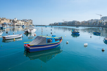 Colorful Boats in Harbor of Marsaxlokk Malta at springtime