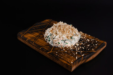 salad with nuts on a black background