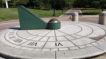 sundial in the park - obrazy, fototapety, plakaty