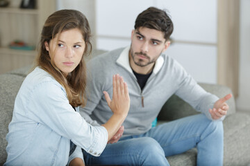 woman ignoring boyfriend after an argument