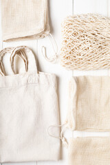 Eco-friendly cotton bags on white background