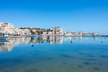 Fototapeta premium Colorful Boats in Harbor of Marsaxlokk Malta at springtime
