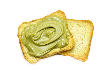 toast with pistachio cream lying on plain toasts isolated on white.