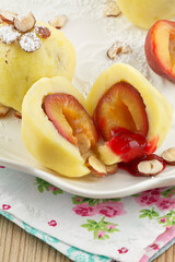 Plum dumplings from potato dough with hazelnuts series picture 04