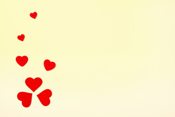 Red heart shaped buttons. Valentines day background with buttons heart. Top view. Copy Space for text. Red hearts frame.