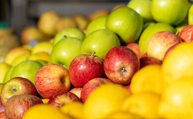 Farmers market, red and green apples, fresh and colorful.