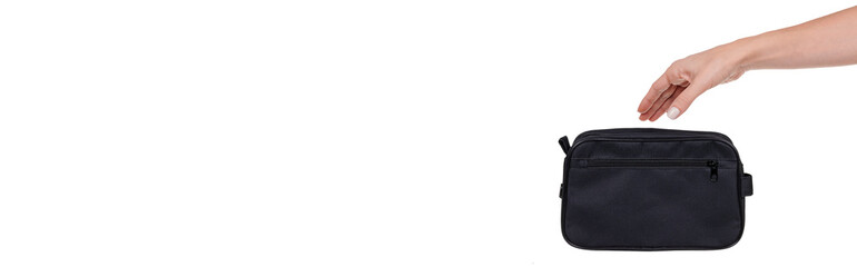 Hand with mens cosmetic bag for hygiene supplies, isolated on white background.