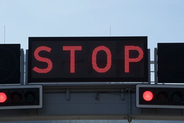 red stop sign in traffic