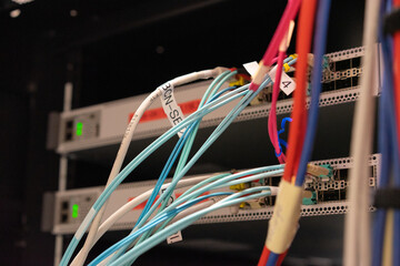 Network cable and switch, data center in server room.
