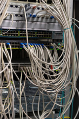 Network cable and switch, data center in server room.